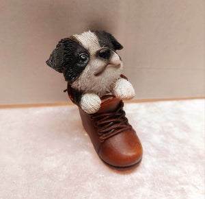 Vivid arts puppy in boot - border collie